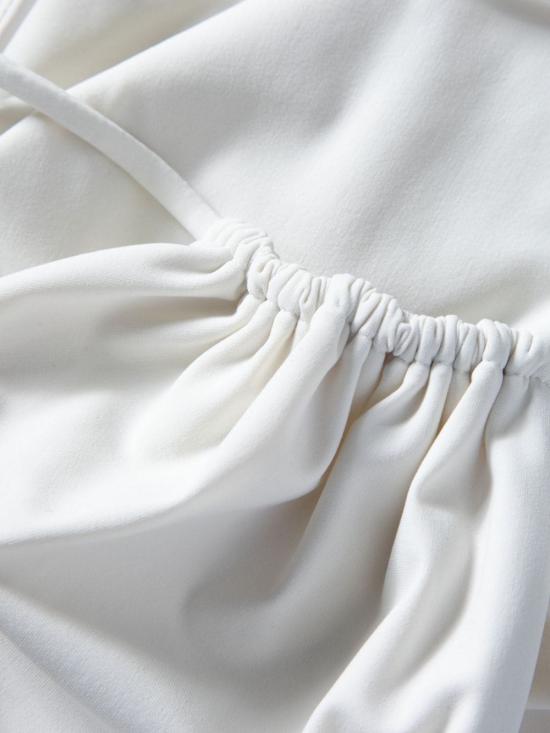  생로랑 백리스 브이 홀터 스윔수트 783574 Y37PG9078 Bianco crema - SAINT LAURENT