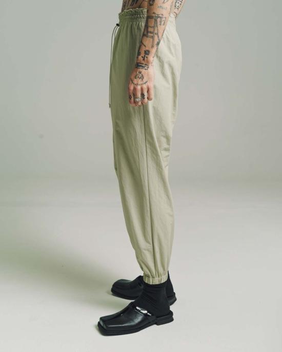  카미엘 포트젠스 트레이닝/조거 팬츠 카미엘 포젠스 나일론 테크 스웨트 팬츠 라이트 그린 - CAMIEL FORTGENS