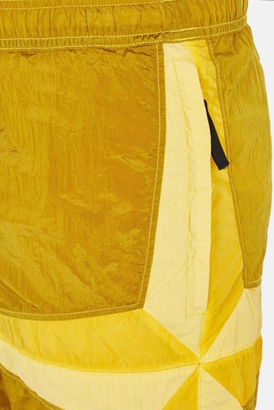  스톤 아일랜드 숏팬츠 에코닐 나일론 메탈 스타 인레이 반바지 옐로우 - STONE ISLAND