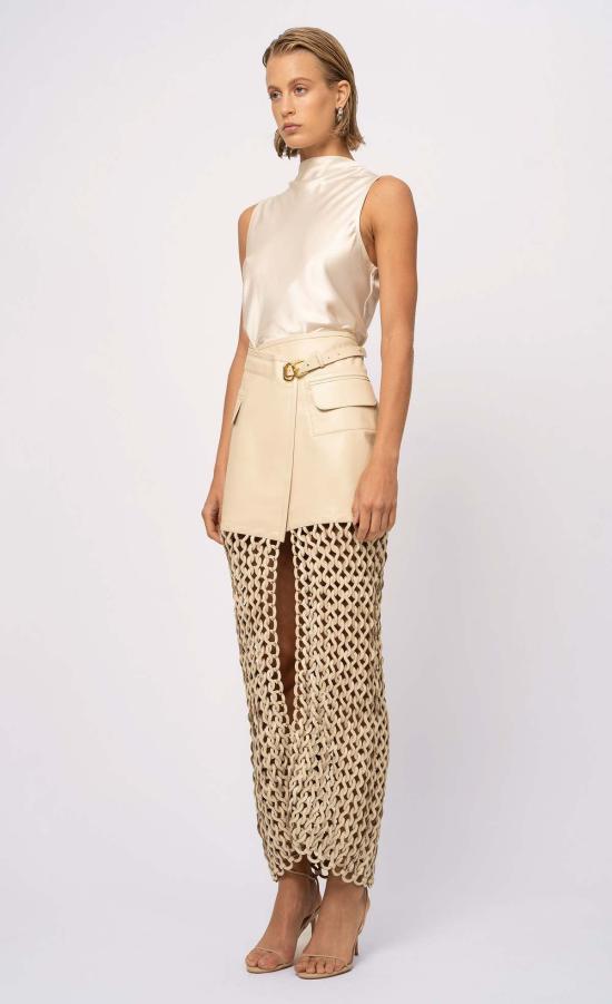  논살란트 레이블 미디 스커트 논샬란트 라벨 칼란 스커트 크림 - NONCHALANT LABEL