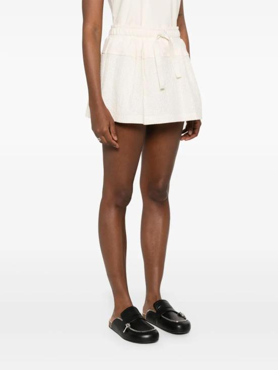  몽클레어 숏 스커트 K10938H0001889AXF beige - MONCLER