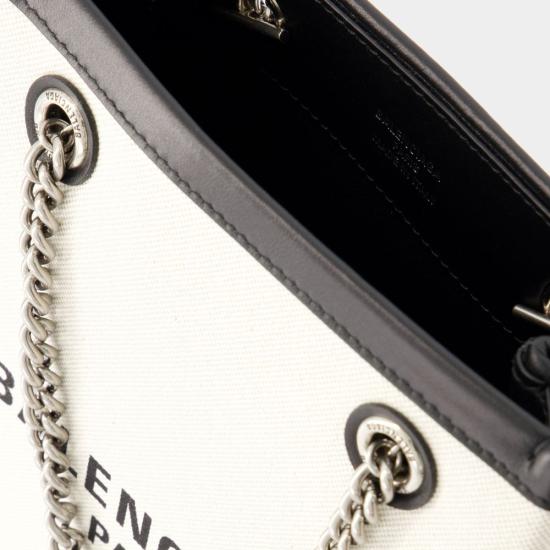 25FW 발렌시아가 듀티 프리 폰 홀더 7613032AAOK 9260 BEIGE O TAN - BALENCIAGA