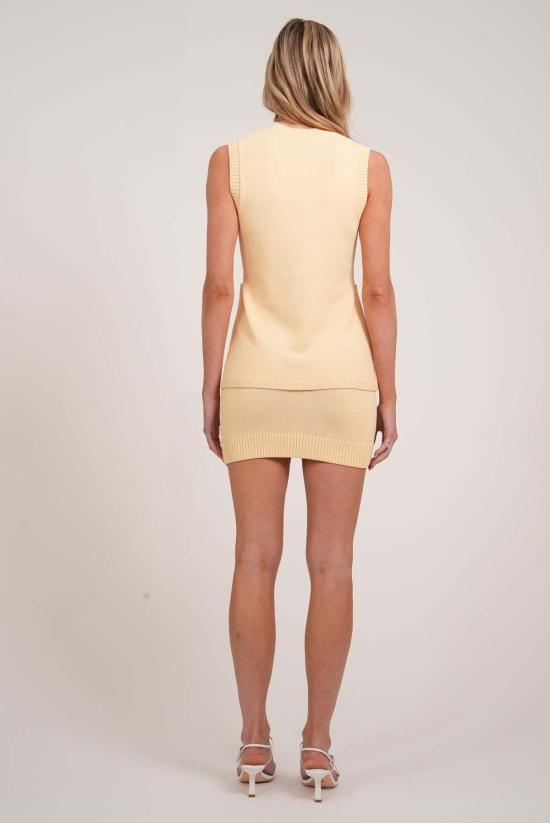  파렌테지 숏 스커트 이슬라 니트  파스텔 옐로우 - PARENTEZI