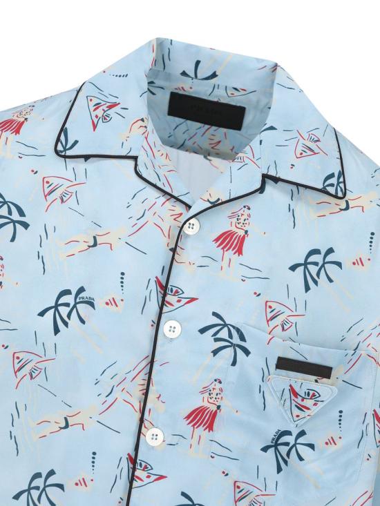 25FW 프라다 반팔 셔츠 UCS52417OYF0076 AI25 Blue - PRADA