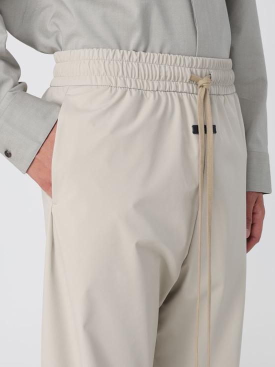 25FW 피어오브갓 트레이닝/조거 팬츠 FGE240404PON 024 Beige - FEAR OF GOD