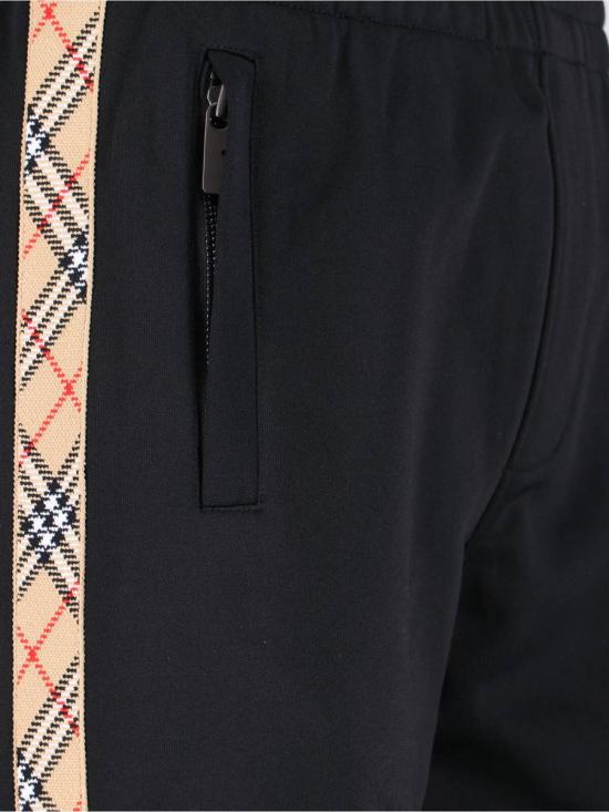 25FW 버버리 체크 트리밍 코튼 블렌드 트랙 팬츠  8110564A1189 Black - BURBERRY