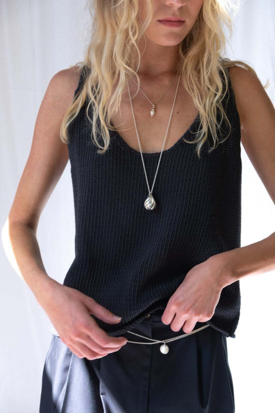  샤이나 모트 민소매 티셔츠 코바 조끼