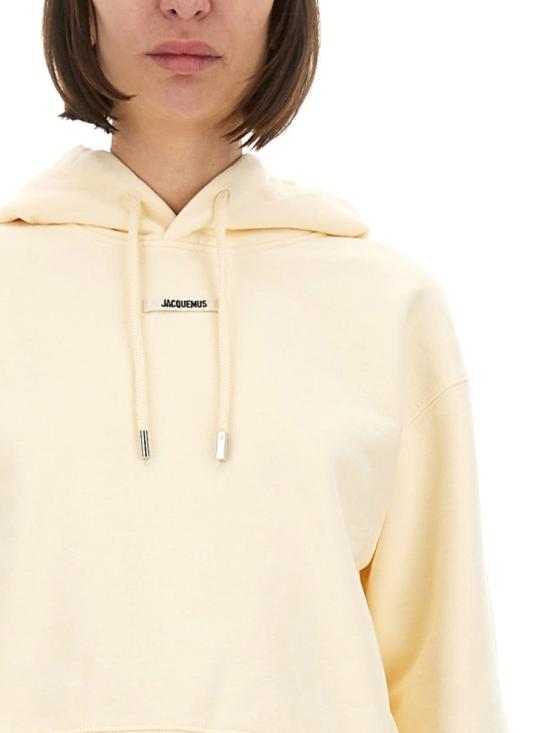 25FW 자크뮈스 르 그로그랭 후드 티셔츠 HOW00247AJ0 0109130 Neutrals - JACQUEMUS