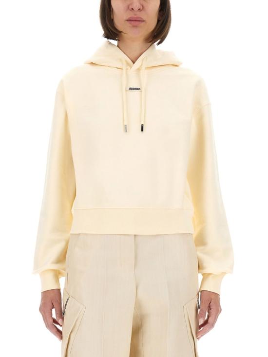25FW 자크뮈스 르 그로그랭 후드 티셔츠 HOW00247AJ0 0109130 Neutrals