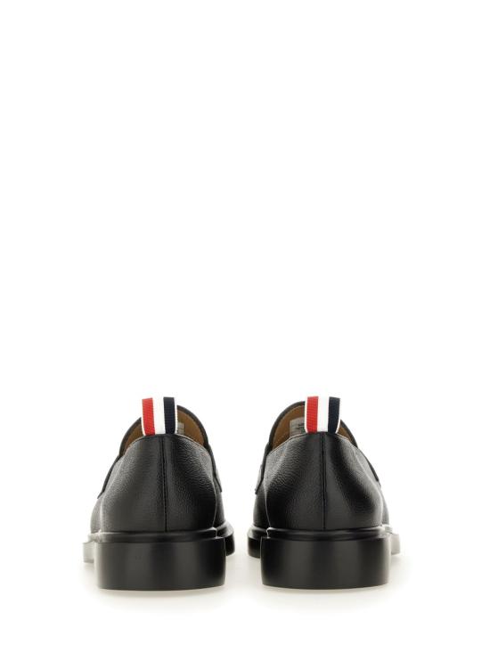 26SS 톰브라운 페블 그레인 라이트웨이트 러버 솔 페니 로퍼 MFD054G 00198001 BLACK - THOM BROWNE