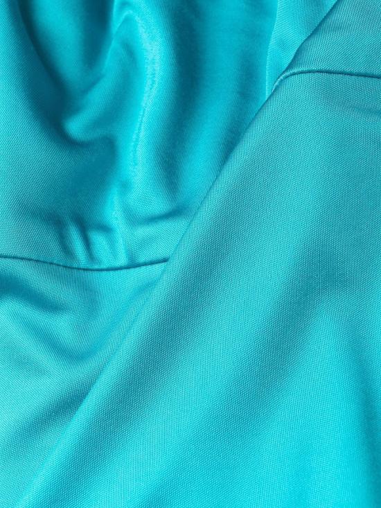  베르사체 미디 스커트 10087451A005721V940 Light Blue - VERSACE