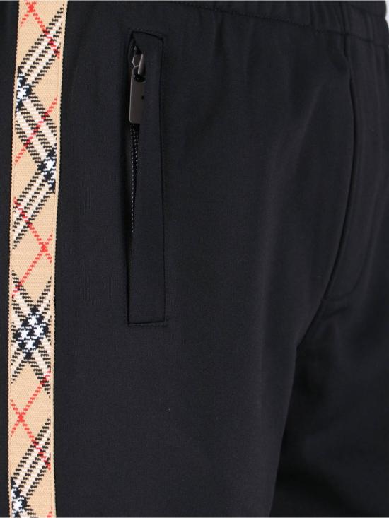 25FW 버버리 체크 트리밍 코튼 블렌드 트랙 팬츠  8110564A1189 Black - BURBERRY