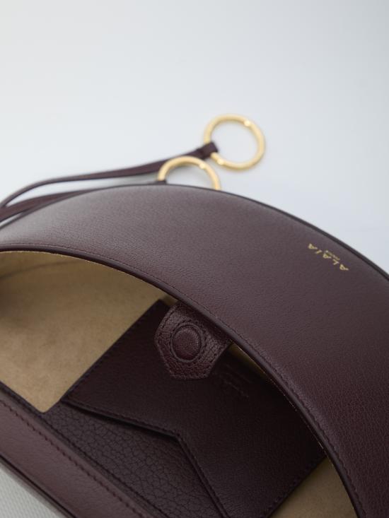 25FW 알라이아 크로스백 AA1L2013CA212 BORDEAUX - ALAIA