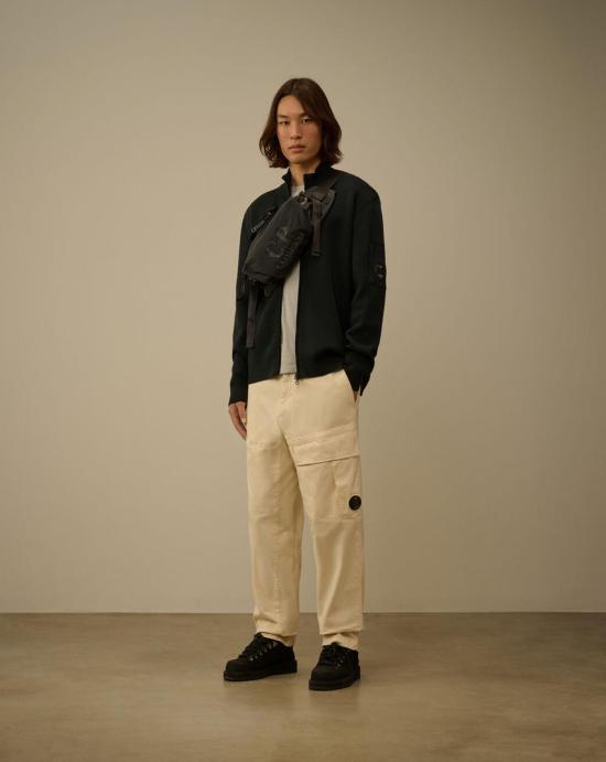 25FW 씨피 컴퍼니 리울 풀 집 렌즈 가디건 제트 19CMKN202A006595A 699 Jet set - C.P. COMPANY