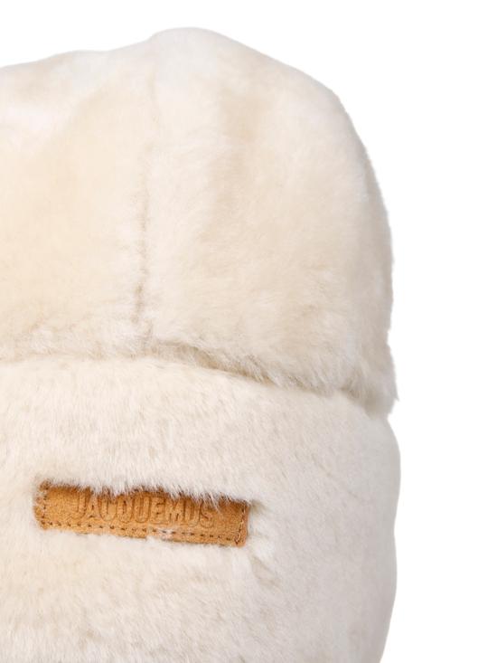 25FW 자크뮈스 이어플랩 캡 25HACU00782AC16S02 110 OFF WHITE - JACQUEMUS