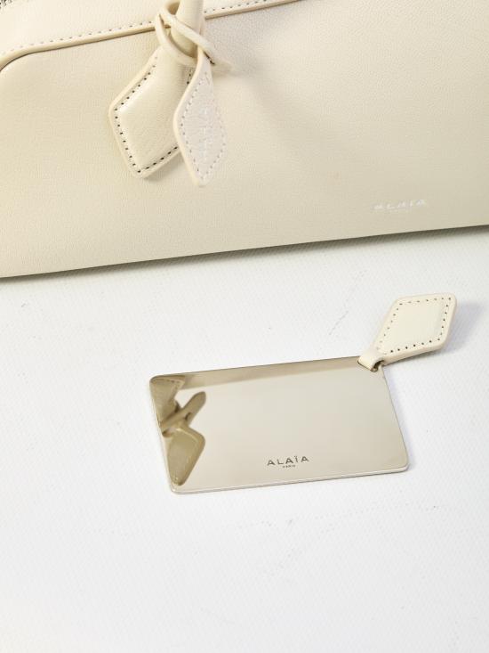 26SS 알라이아 르 테켈 미디움 레더 숄더백 AA1S06033CA212 WHITE - ALAIA