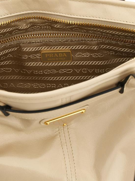 26SS 프라다 보니 미디엄 스웨이드 핸드백 1BA426VMOO2CYRF03MV Beige - PRADA