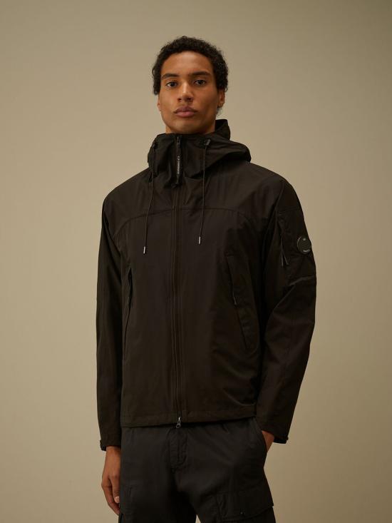 26SS 씨피 컴퍼니 프로텍 렌즈 후드 자켓 20CMOW011A 110264A 999 Black - C.P. COMPANY