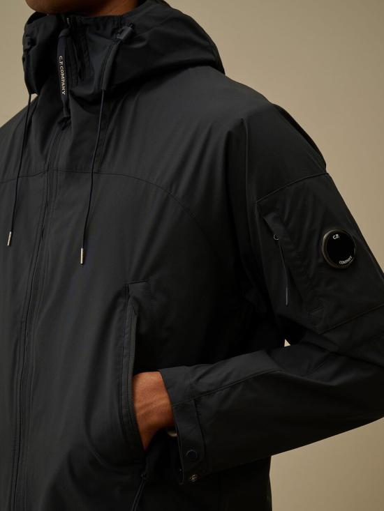 26SS 씨피 컴퍼니 프로텍 렌즈 후드 자켓 20CMOW011A 110264A 889 Midnight navy - C.P. COMPANY
