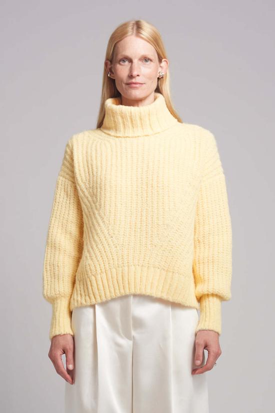  일레븐 식스 터틀넥 알리 스웨터