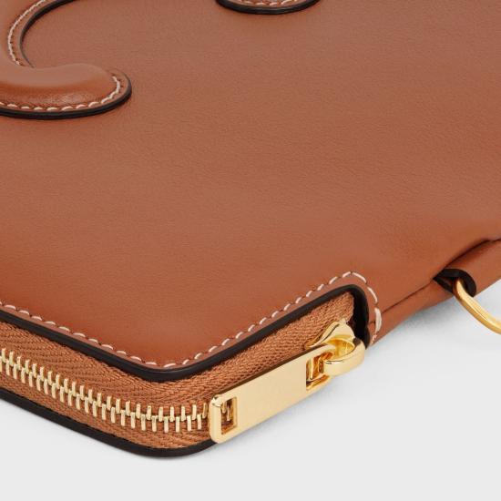 26SS 셀린느 트리옹프 스몰 스트랩 파우치 10J983DR8 04LU TAN - CELINE