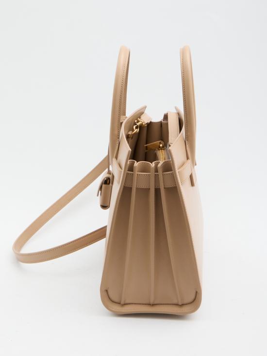 26SS 생로랑 스무스 레더 삭 드 주르 베이비백 42186302G9W9295 Beige - SAINT LAURENT