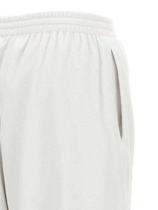 26SS 발렌시아가 커시브 배기 팬츠 857661TTO049012 - BALENCIAGA