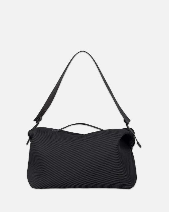  이세이 미야케 캐리어 옴므 플리츠 트래블 백 블랙