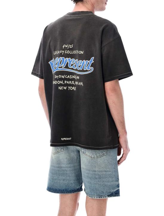  리프레젠트 탑 검정색으로 물든 티셔츠를 선보입니다. - REPRESENT
