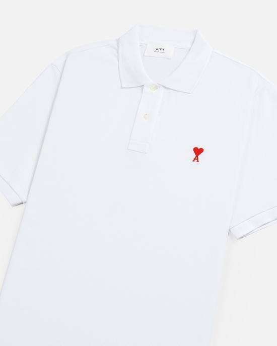 26SS 아미 스몰 하트 로고 폴로 티셔츠 BFUPL001760 100 - AMI