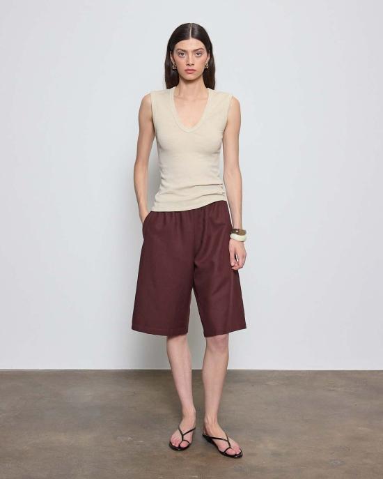  엔자 코스타 민소매 티셔츠 텍스처드 립 슬리브리스 V 탱크탑