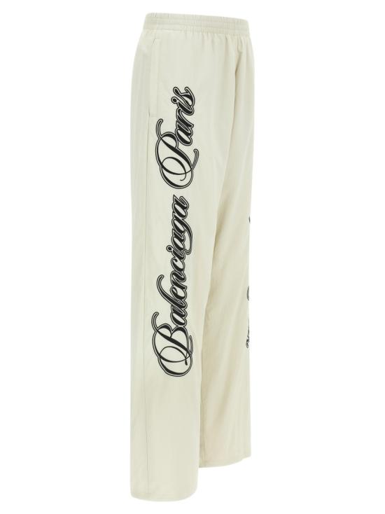 26SS 발렌시아가 커시브 배기 팬츠 857661TTO049012 Neutrals - BALENCIAGA