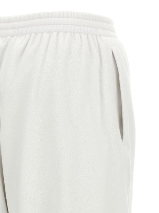 26SS 발렌시아가 커시브 배기 팬츠 857661TTO049012 Neutrals - BALENCIAGA