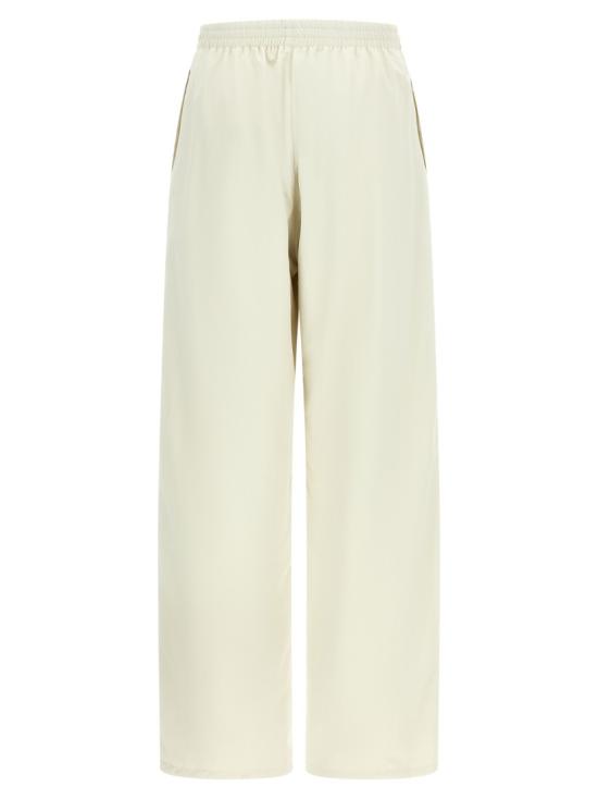 26SS 발렌시아가 커시브 배기 팬츠 857661TTO049012 Neutrals - BALENCIAGA