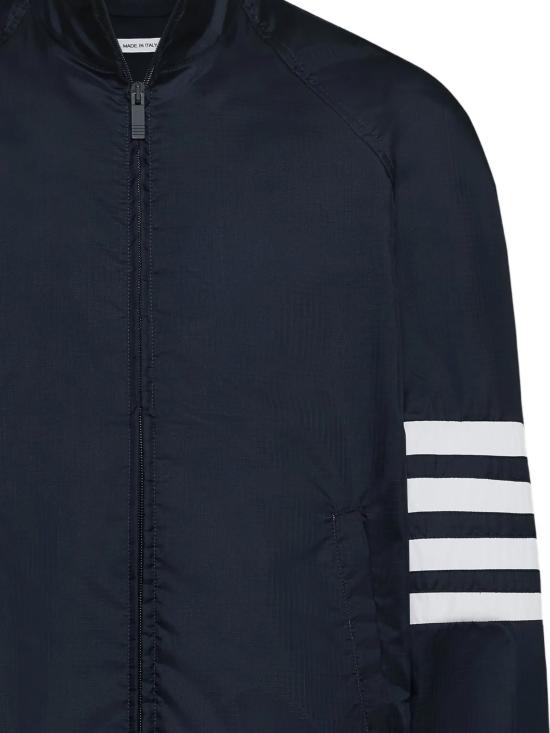 26SS 톰브라운 샤이니 립스탑 래글런 4바 트랙 재킷 MJU583C F1095415 Navy - THOM BROWNE