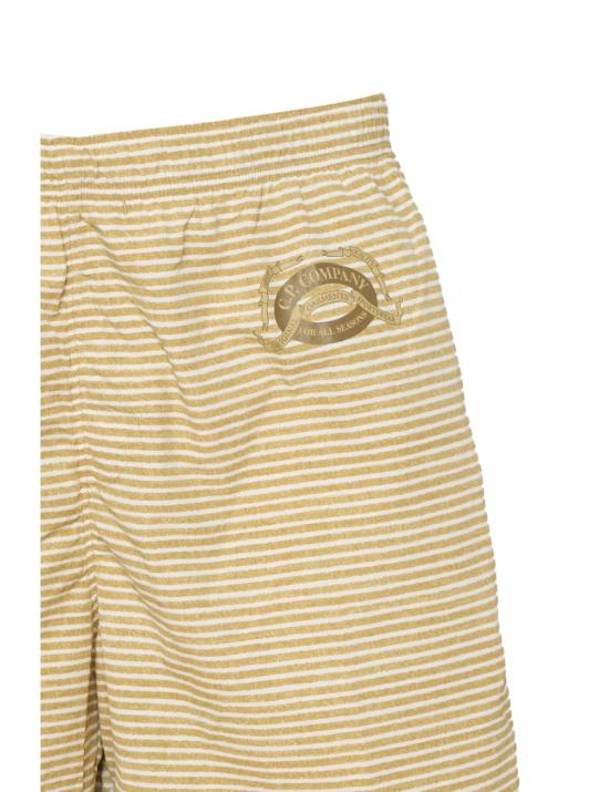 26SS 씨피 컴퍼니 스윔팬츠 20CMBW289A110690P 246 Giallo - C.P. COMPANY