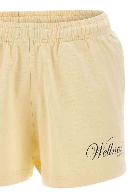 26SS 스포티앤리치 숏팬츠 SH03776083YE02 ALMOND YELLOW - SPORTY & RICH