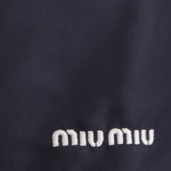 26SS 미우미우 테크니컬 가자르 및 플리스 스커트 MG2583SOOO 181AF0008 BLEU - MIU MIU