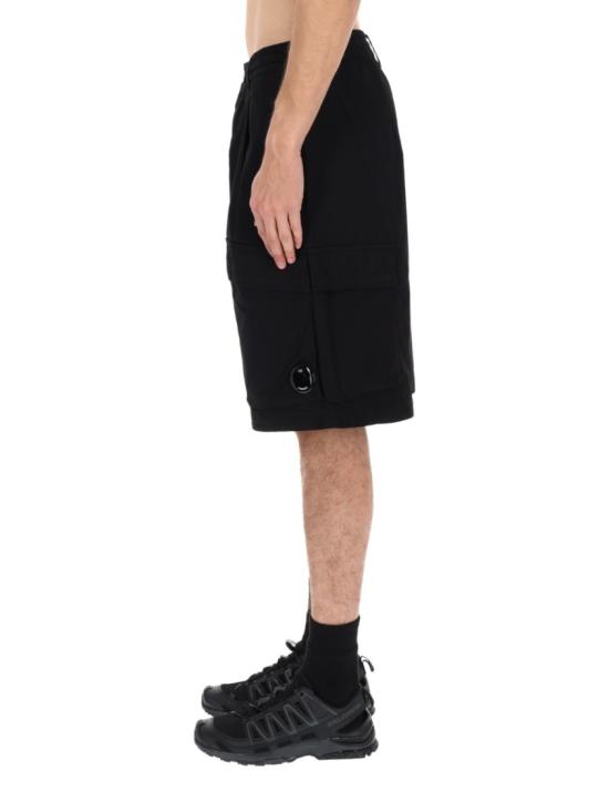 26SS 씨피 컴퍼니 스트레치 사틴 카고 렌즈 쇼츠 20CMBE127A 110325G999 Black - C.P. COMPANY