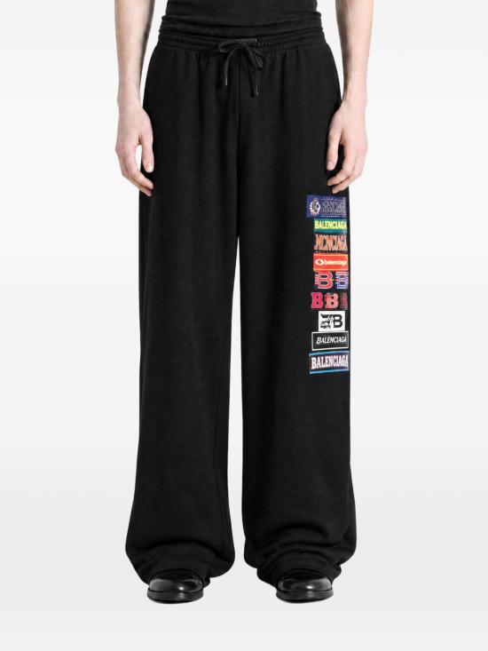 26FW 발렌시아가 범퍼 스티커 배기 코튼 스웨트팬츠 871496TUVS8 1000 BLACK