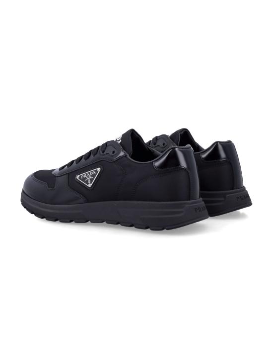 26SS 프라다 프랙스 2.0 스웨이드 시어링 로우탑 스니커즈 2EE443FG0003LF5 F0002 Nero - PRADA