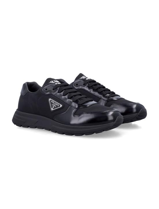26SS 프라다 프랙스 2.0 스웨이드 시어링 로우탑 스니커즈 2EE443FG0003LF5 F0002 Nero - PRADA
