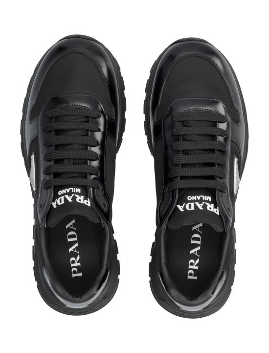26SS 프라다 프랙스 2.0 스웨이드 시어링 로우탑 스니커즈 2EE443FG0003LF5 F0002 Nero - PRADA