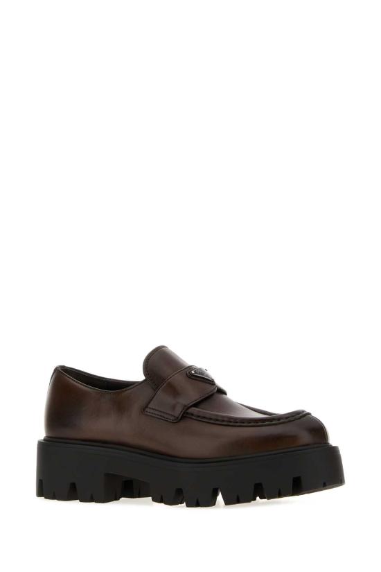 26FW 프라다 모노블럭 러버솔 레더 로퍼 1D185OFB0503KDP F0562 Brown - PRADA