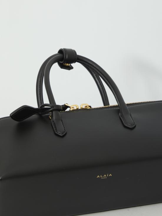 26FW 알라이아 카무플라주 델타 백 스몰 백 AA1L1015I255 999 BLACK - ALAIA