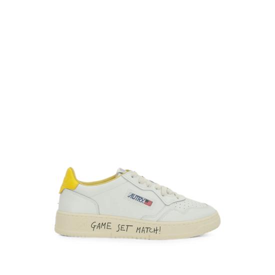 26FW 오트리 메달리스트 로우 스니커즈 AULM ML07 WHITE YELLOW