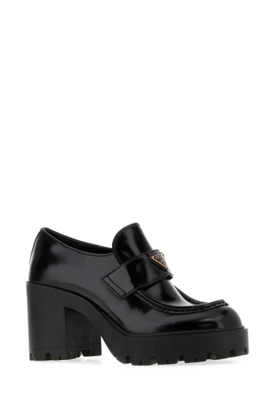 26FW 프라다 로고 플라크 가죽 펌프스 1D563OF085055 F0002 Black - PRADA