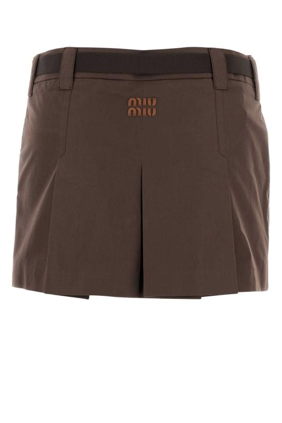 25FW 미우미우 로고 패치 플리츠 미니 스커트 MG2485SOOO12NS F0324 BROWN - MIU MIU