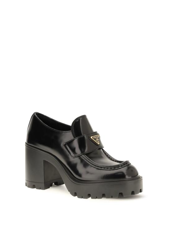 26FW 프라다 로고 플라크 가죽 펌프스 1D563OF085055 F0002 NERO - PRADA