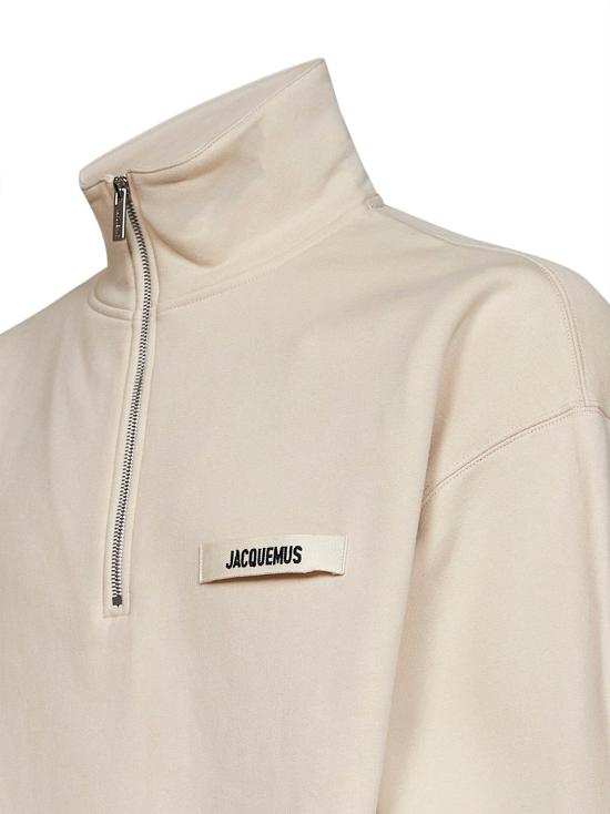 26FW 자크뮈스 하프 집업 스웨트 셔츠 SSM00313AJ00174 150 BEIGE - JACQUEMUS